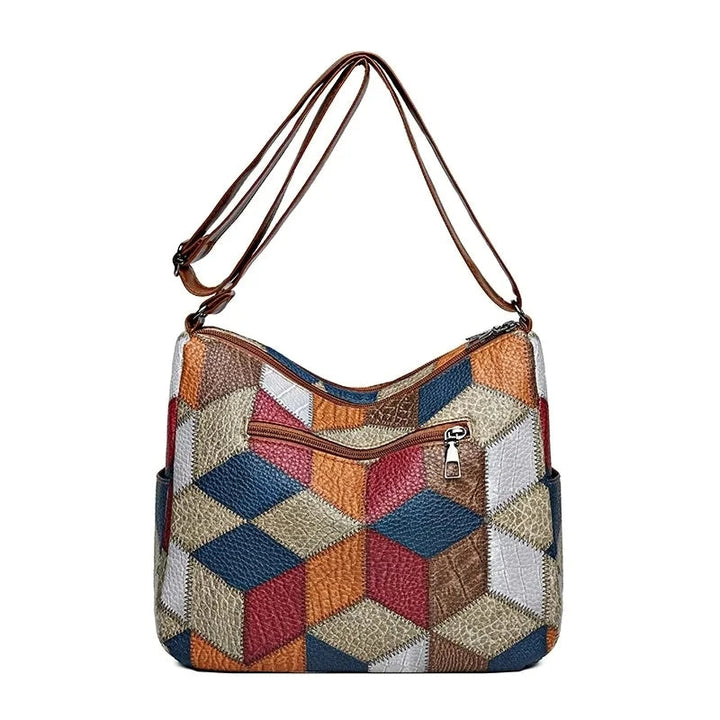 Carly – Handtasche aus veganem Leder im geometrischen Patchwork-Design