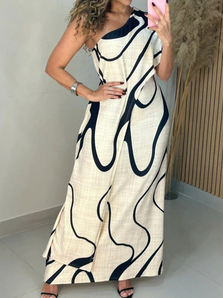 Merylle – Schulterfreies Maxikleid mit abstraktem Muster