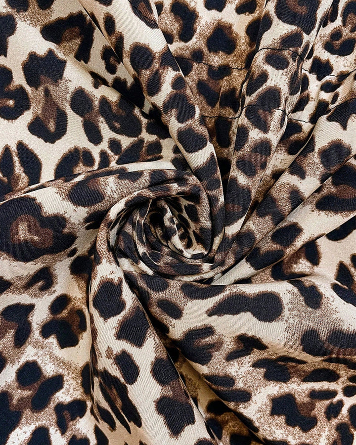 Savannah – Wendbarer Leopardenmantel mit Kapuze